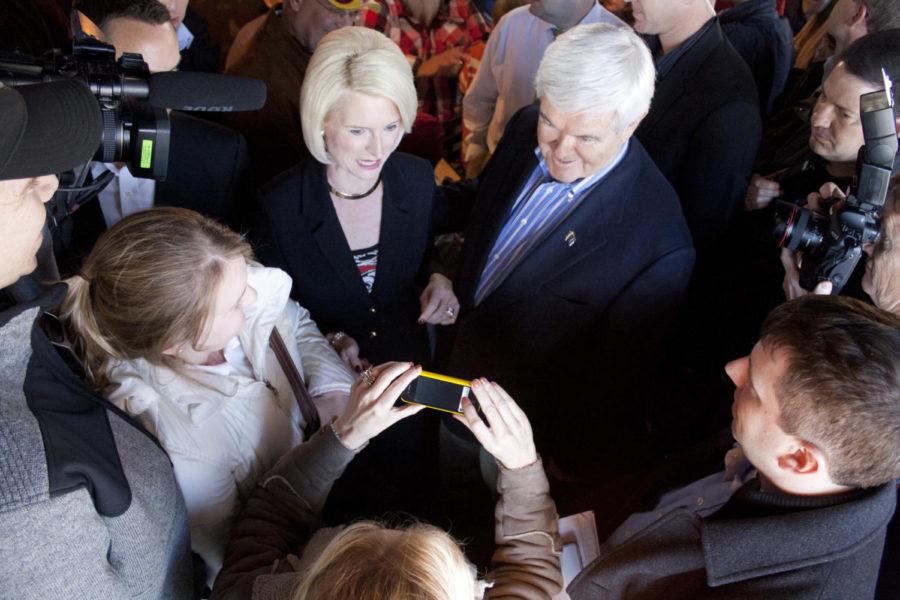 Newt+Gingrich+makes+his+way+through+a+standing+room+only+crowd+on+Sunday%2C+Jan.+1+at+West+Towne+Pub+in+Ames.+Crowd+memebers+included+a+a+group+of+high+school+students+from+Ohio+in+Iowa+to+learn+about+the+caucus.%0A