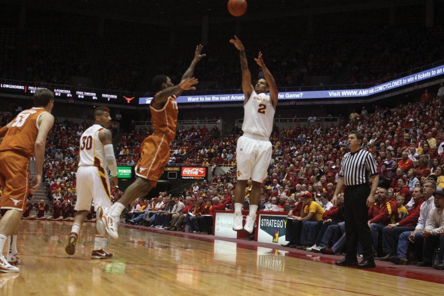 Guard Chris Babb attempts one of this five made 3-pointers
against Texas on Wednesday, Jan. 4. Babb lead the team in threes,
adding to the team total of 10 3-pointers.
