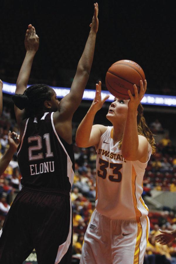 Chelsea Poppens dives down the lane, putting up one of her 10
points in Saturday nights game against Texas A&M. The Cyclones
struggled on offense, only putting up 33 total points.
