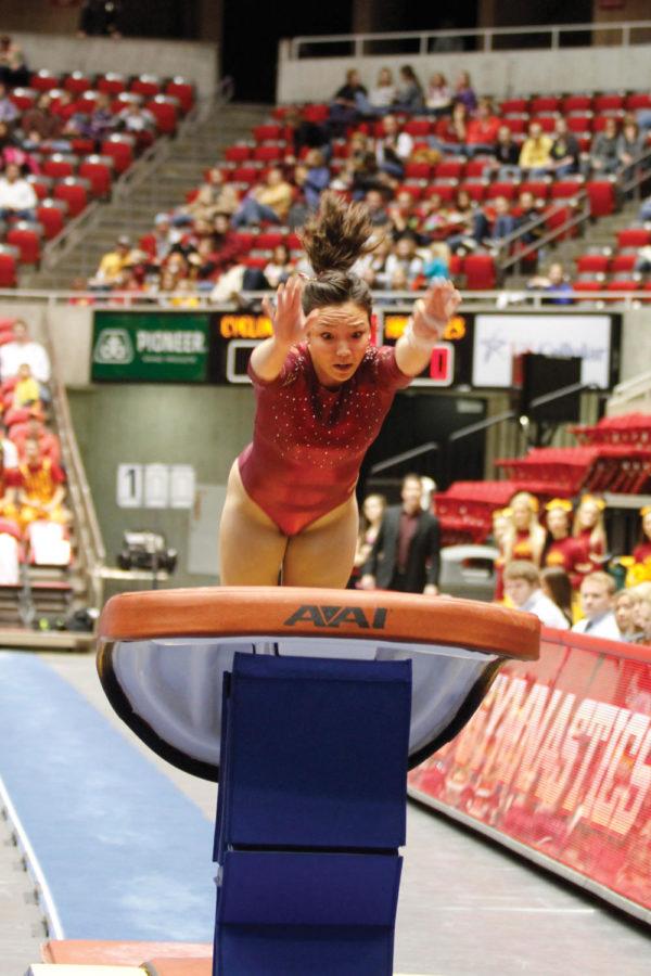 Michelle Browning prepares to go off of the vault during the
meet Friday, Jan. 27, at Hilton Coliseum. Browning recieved a 9.825
for the event to help the Cyclones defeat the Hawkeys
194.900-194.550.
