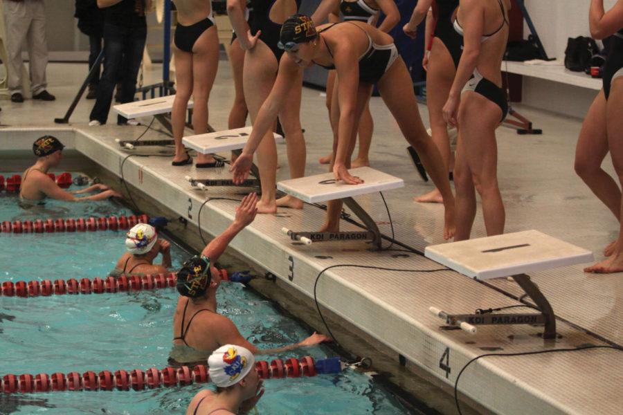 Relay+teammates+celebrate+after+winning+the+200-yard+freestyle%0Arelay%C2%A0Saturday%2C+Feb.+4%2C+at+Beyer+Hall.+The+Cyclones+clocked+a+time%0Aof+1%3A35%3A69%2C+giving+Iowa+State+11+points+toward+its+victory+against%0AKansas.%0A