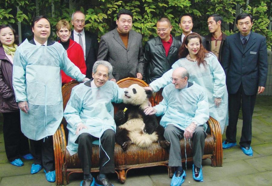 Paul Shao, sitting on left, professor of architecture, visits the Chengdu Research Base of Giant Panda Breeding in China in November 2004. Shao has been working to build a research park for pandas in Des Moines. 

