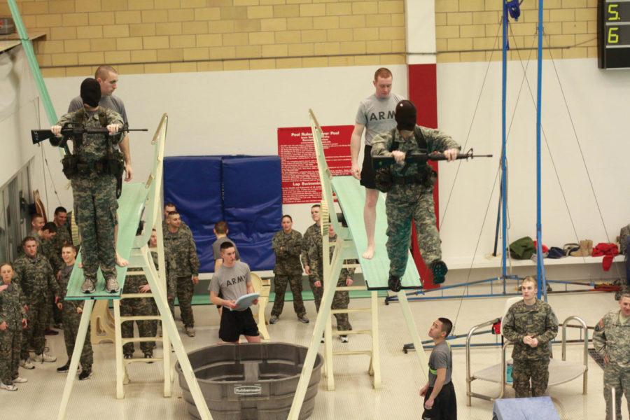 Cadets practice 3-meter entries during the ROTC lab on
Wednesday, Feb. 22, at Beyer Hall. They learned different tips for
surviving in the water at the lab. 

