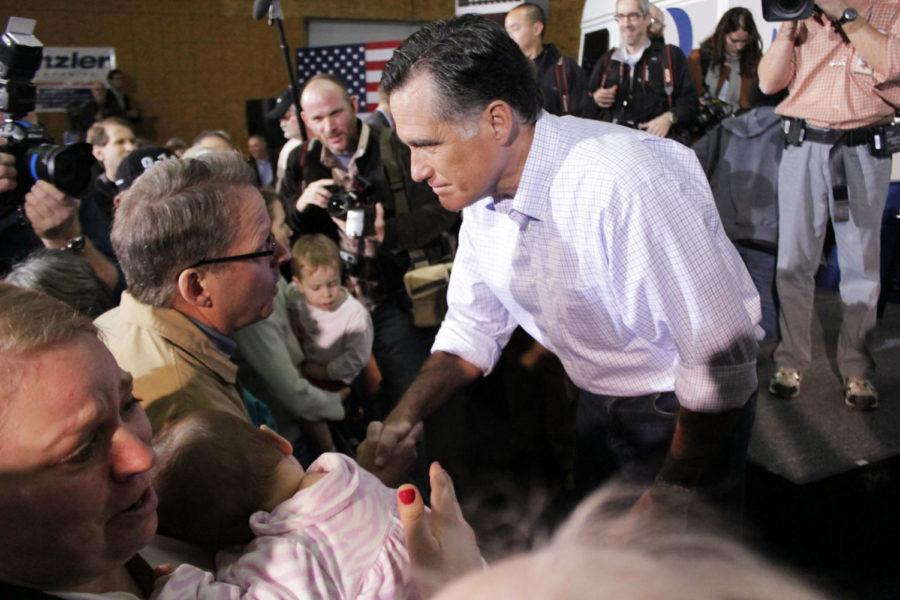 Mitt Romney, former Republican governor of Massachusetts, meets
with supporters during a campaign stop at Kinzler Construction in
Ames on Thursday, Dec. 29. Romney was the projected winner in
Flordias primary on Jan. 31.
