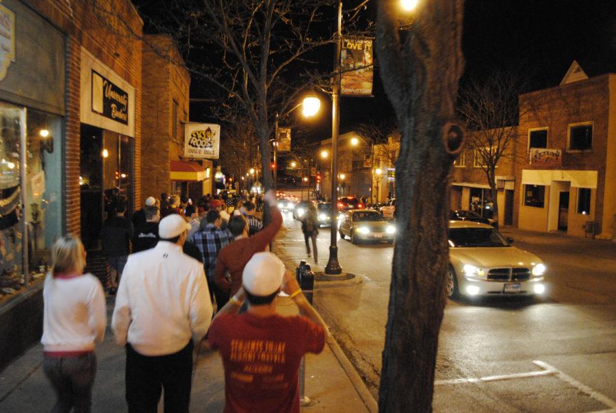 Community members celebrate the announcement of the death of Osama bin Laden on Welch Avenue on Sunday night. 