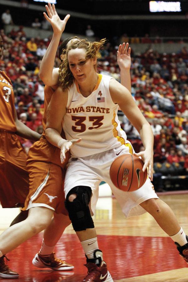 Forward Chelsea Poppens moves around the Texas opposition and
toward the hoop Saturday, Feb. 4. Poppens lead the team in both
scoring and rebounds, with a total of 27 points and 10 rebounds, in
the Cyclones win.
