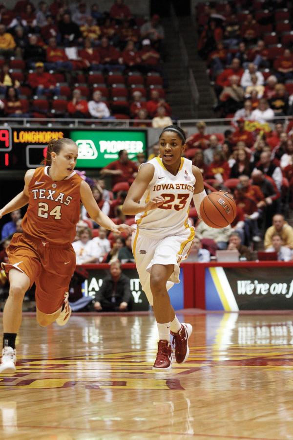 Guard Chassidy Cole moves the ball down the court during the
game against Texas on Saturday, Feb. 4. The Cyclones beat the
Longhorns 71-56.
