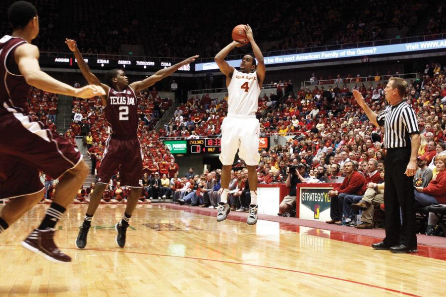 Guard Chris Allen goes up for a 3-pointer over the Texas A&M
opposition during the game on Saturday at Hilton Coliseum. Allen
led the team in scoring with a total of 25 points throughout the
game.
