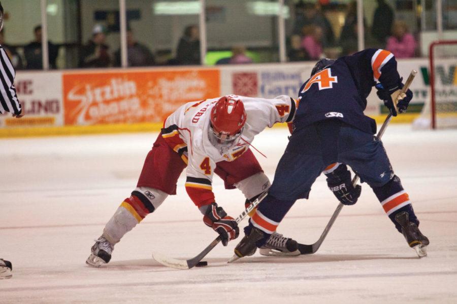 Shawn Crawford faces off for the puck. The hockey team faced up
against the University of Illinois on Friday, Oct. 28. The Cyclones
lost 1-0.
