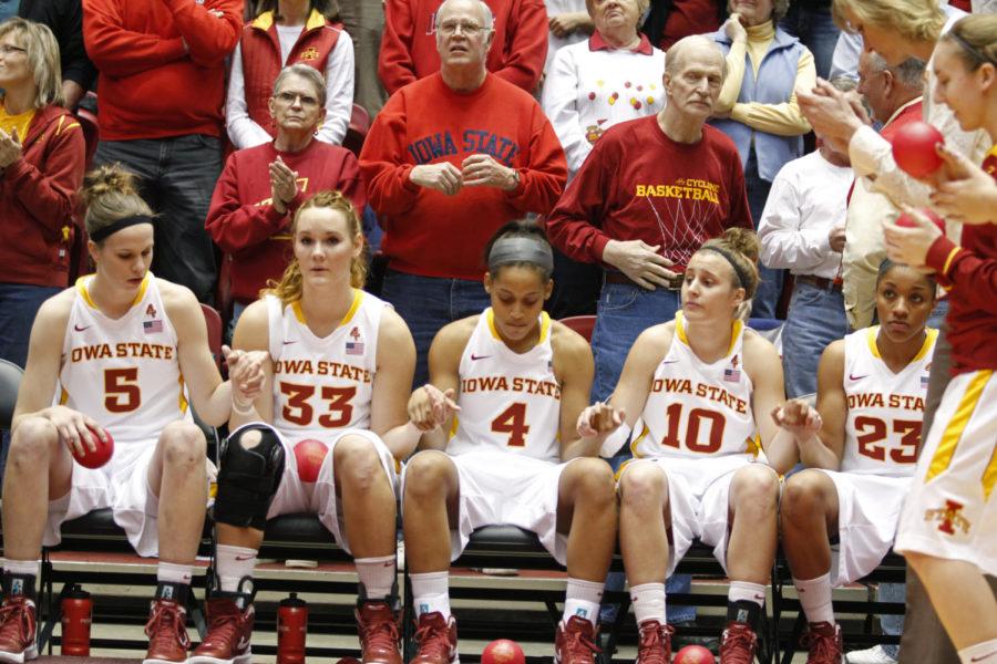 The starters await their announcement before the beginning of
the Iowa State - Oklahoma State game Wednesday night at Hilton
Coliseum. The Cyclones defeated the Cowgirls 73-52.
