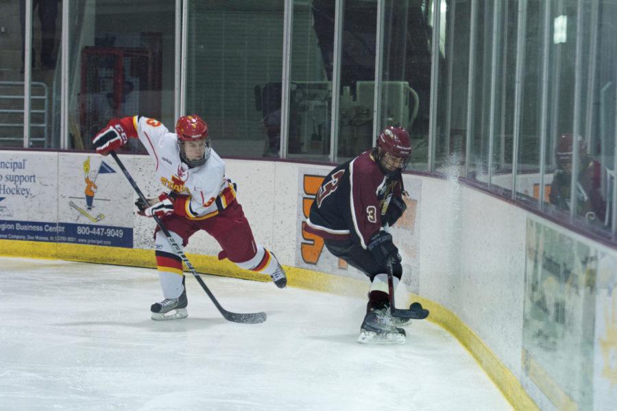 Antti Helanto, defense, guards a player from Robert Morris
University on Saturday, Jan. 28, at the ISU/Ames Ice Arena. The
Cyclones lost to the Eagles 6-4.
