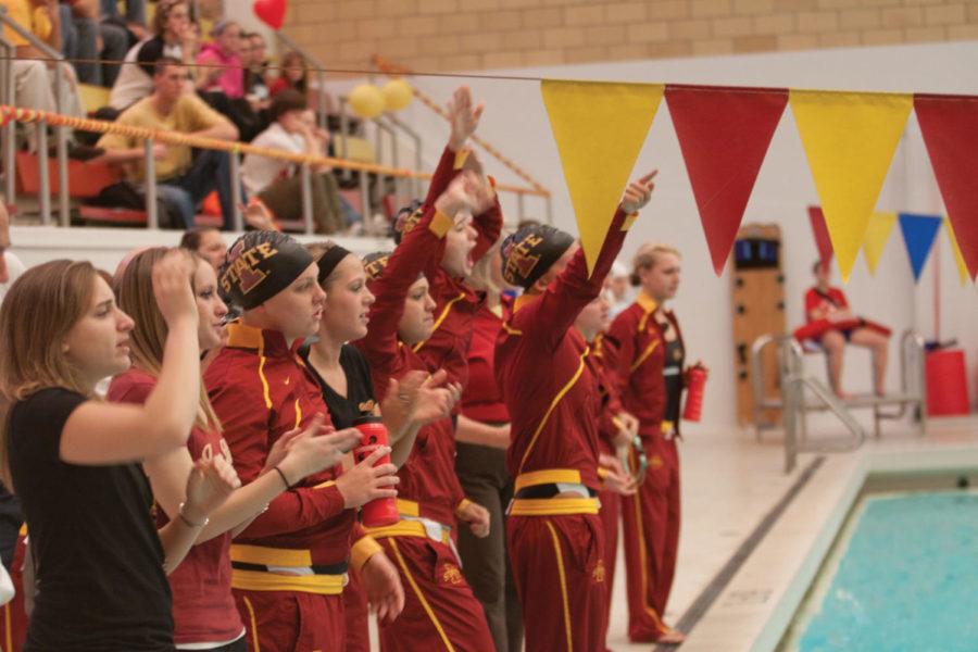 Members of the swimming and diving team cheer on their teammates
during the Iowa State swim meet against Kansas on Saturday, Feb. 4,
at Beyer Hall.
