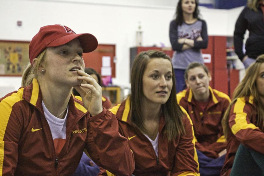 All-around gymnast Celine Paulus, left, and the rest of the gymnastics team watch as the NCAA Gymnastics Committee announces regional and championship sites for the 2012 and 2013 National Collegiate Women’s Gymnastics Championships. The Cyclones were picked to compete April 7 in Salt Lake City.

