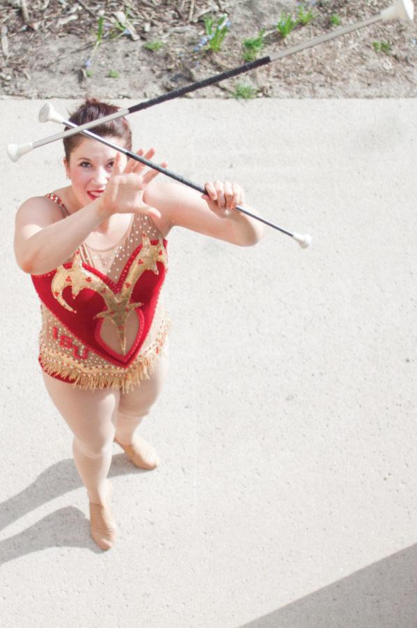 Karen Whitman, junior in event management, is a baton twirler for the ISU Cyclone Football Varsity Marching Band. She took top honors in the Collegiate 3-Baton event at the Eighth U.S. Intercollegiate and National High School Baton Twirling Championships. 
