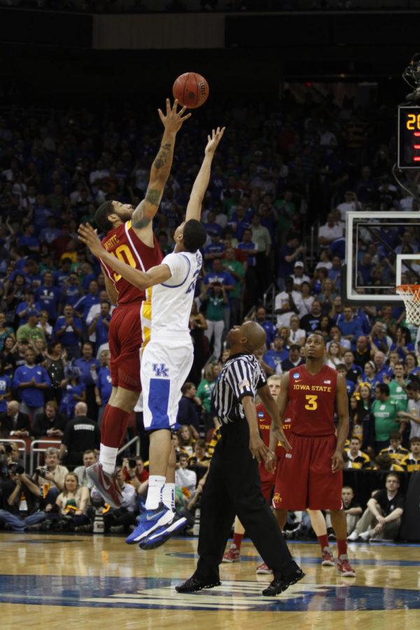 ISU forward Royce White and Kentucky forward Anthony Davis jump for the opening tip to start the teams matchup in the third round of NCAA tournament play in Louisville, Ky., on Saturday, March 17.
