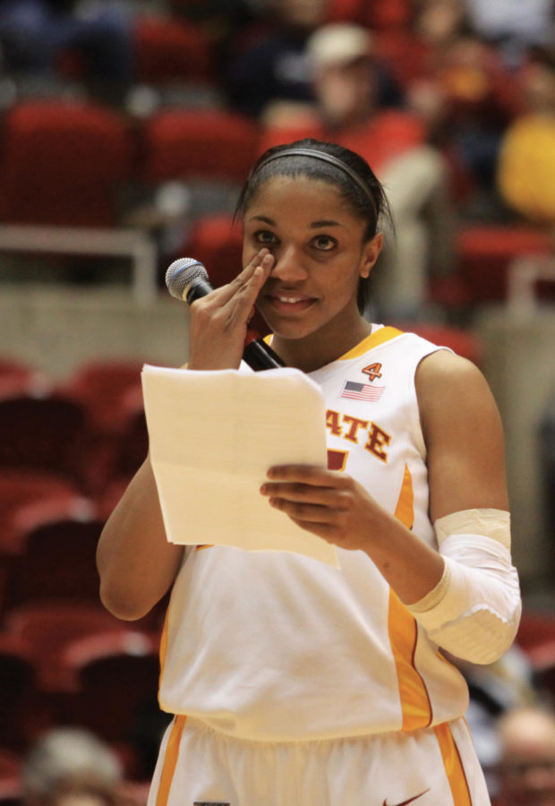 Senior guard Chassidy Cole wipes a tear while addressing the crowd at Hilton Coliseum following the ISU womens basketball game against Kansas State on Wednesday, Feb. 29. The Cyclones defeated the Wildcats on senior night by a score of 57-33. 
