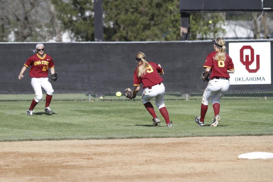 Cyclone outfielders swarm to a pop-up after one of Northern Iowas 13 hits Tuesday, March 27, at the Southwest Athletic Complex. The field struggled in Tuesdays game, committing one error and allowing eight runs.
