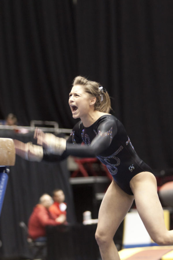 Iowas Annie Szatkowski reacts to her performance on the balance
beam during the Iowa State-Iowa meet Friday, Jan. 27, at Hilton
Coliseum. Szatkowski, Iowa States Caitlin Brown and Michelle
Browning all had a three-way tie for second place with a score of
9.825 in the event. 
