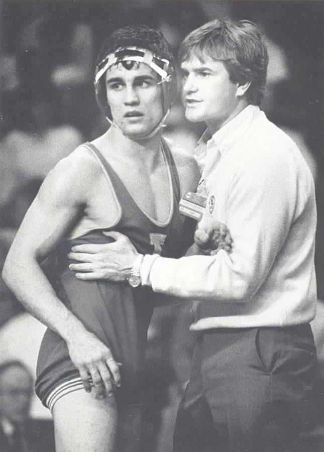 Jeff+Gibbons%2C+left%2C+Iowa+States+third-place+finisher+at+134+pounds%2C+and+ISU+wrestling+coach+Jim+Gibbons+talk+at+the+1987+NCAA+Championships.+The+Cyclones+won+the+team+title.%0A