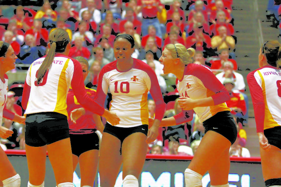 The team celebrates after scoring against Miami in the second
round of the NCAA Volleyball Championship on Saturday, Dec. 3. Iowa
State beat Miami in the first three sets, advancing them to the
Sweet 16.
