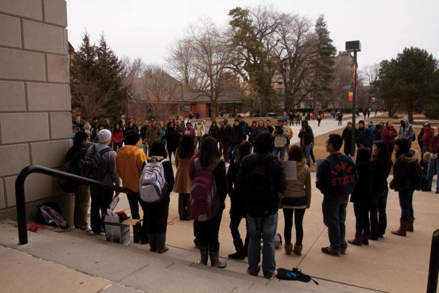 Students come together to take a stand against the current racial controversies at Iowa State on Friday, March 2. Many students as well as some professors discussed personal stories of racism they have encountered. The rally was outside Parks Library in the free-speech zone.
