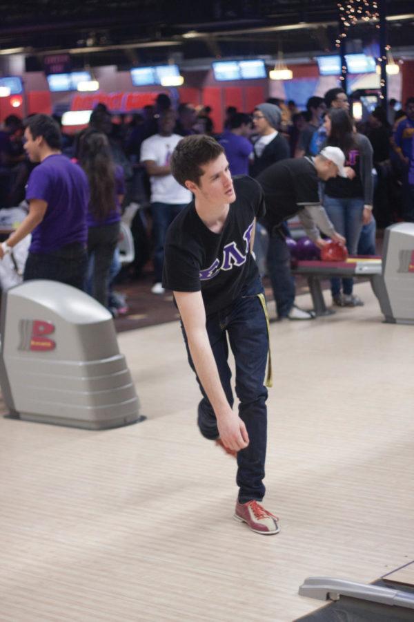 Luke Whitaker from the University of Iowa Sigma Lambda Beta chapter bowls for charity on Saturday, March 3, at Perfect Games in west Ames.
