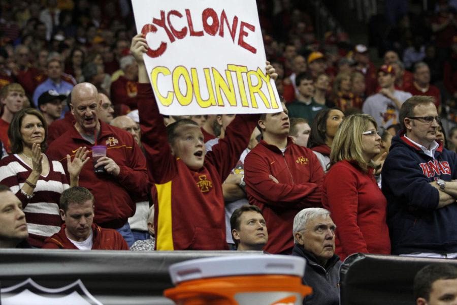 ISU+fans+cheer+as+the+ISU+mens+basketball+team+takes+the+court+prior+to+Thursdays+matchup+with+Texas+in+the+second+round+of+the+Big+12+tournament.+The+Cyclones+lost+71-65%2C+despite+a+crowd+comprised+primarily+of+Cyclone+fans.%0A