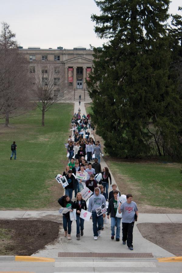 Iowa State students and faculty, and high school students march through Central Campus during the First Amendment Day Freedom March on Thursday, April 7.