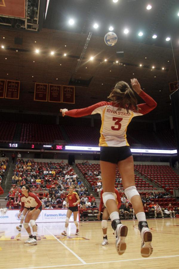 Outside hitter Rachel Hockaday jumps up to spike the ball against Nebraska opponents during the second set of Saturdays game at Hilton. Hockaday gained the Cyclones 13 kills, 35 total attacks, 12 digs and 14 points throughout the four played sets. The night ended with the Huskers defeating the Cyclones 3-1.
