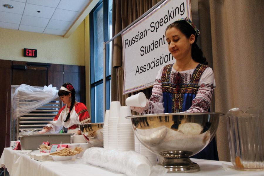 Anna Prisacari, graduate student in chemistry, and Gulnora Tanatar, served food from Russia speaking countries at the International Food Fair on Saturday, April 21 in the Memorial Union. The Russian-Speaking Student Assocation represents 15 different countries. The International Food Fair was brimming with people pushed shoulder to shoulder for the food. 