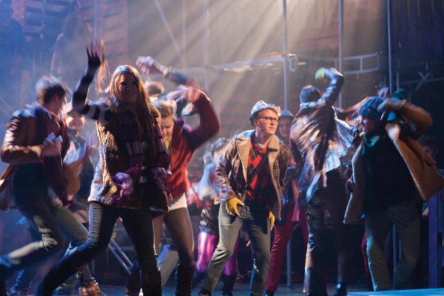 The cast members of Rent dance frantically during a dress rehearsal Tuesday, April 10 at the Fisher Theater.
