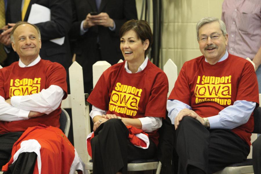 Iowa Rep. Steve King, Lt. Gov. Kim Reynolds and Gov. Terry Branstad laugh during The Truth: Lean Finely Textured Beef, a forum hosted by the ISU Block and Bridle Club on Tuesday, April 10, at the Farm Bureau Pavilion. They all wore shirts indicating they are supporting Iowa agriculture. 
