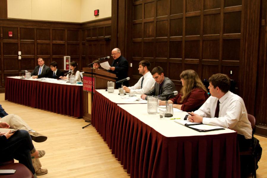 Moderator Thomas Beell, professor of journalism and communication, starts the debate between the College Republicans and ISU College Democrats on Tuesday, April 10, in the South Ballroom in the Memorial Union. The topic was tax breaks.

