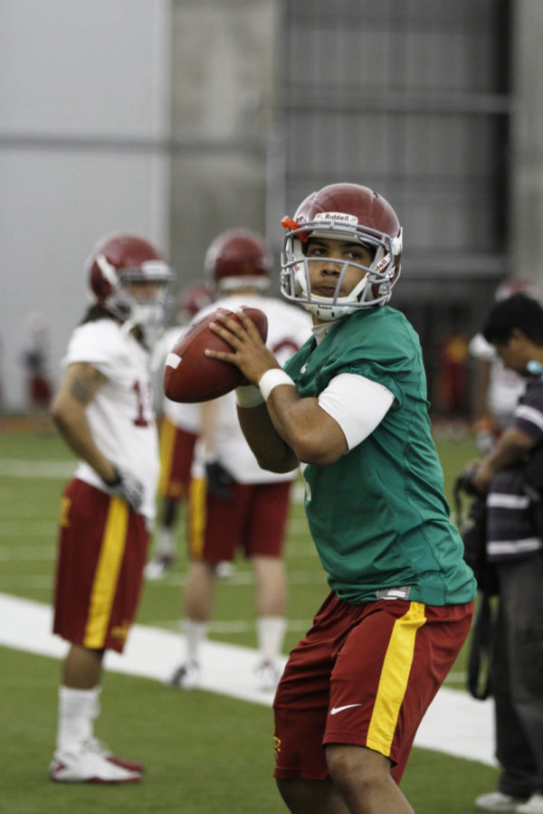 Quarterback Jared Barnett practices Tuesday, March 20, at the Bergstorm Indoor Practice Facility. The starting quarterback position is up for grabs at the start of the spring season.
