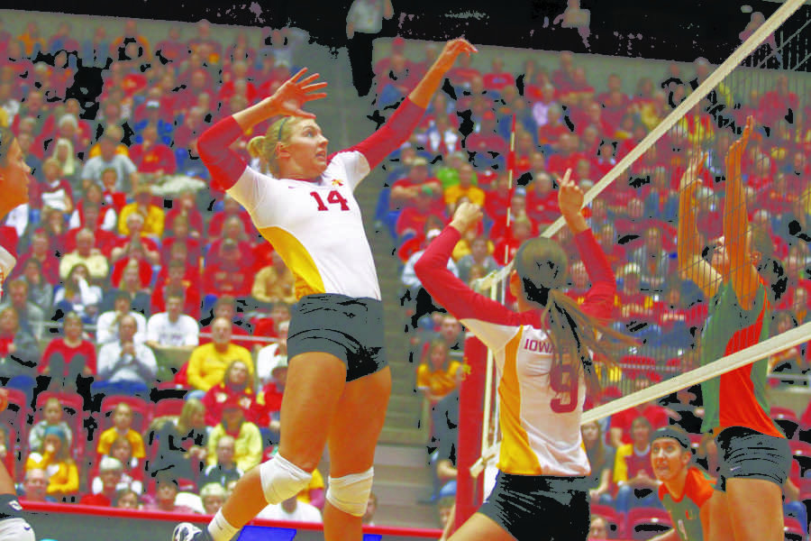 Middle blocker Jamie Straube goes up for a kill against Miami on Saturday, Dec. 3, during the second round of the NCAA Volleyball Championship. Straube lead the team in kills and points with a total of 12 kills and 14 points throughout the match.
