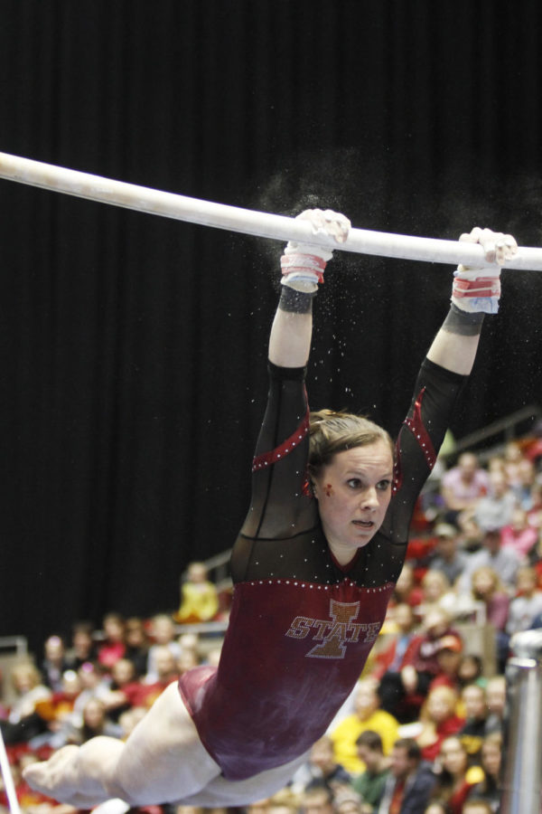 Michelle Shealy prepares to finish her time on the bars during
the Cyclones opening meet, against Nebraska, on Friday, Jan.
20, at Hilton Coliseum. Shealy scored a 9.750 on the bars and
finished the night with an all-around score of 38.925. 
