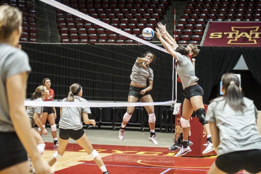 Outside hitter Victoria Hurtt spikes the ball during practice at Hilton Coliseum on Monday, April 9.
