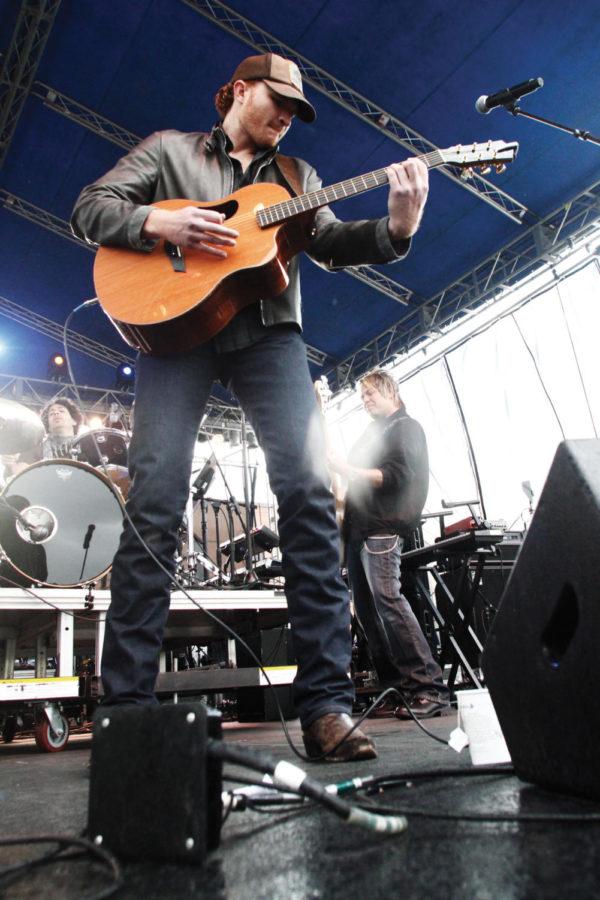 Country singer Eric Paslay performs his song Never Really Wanted at Live @ Veishea in the Molecular Biology parking lot on Saturday, April 21. Paslays song climbed country music charts, peaking at No. 48 in 2011. 
