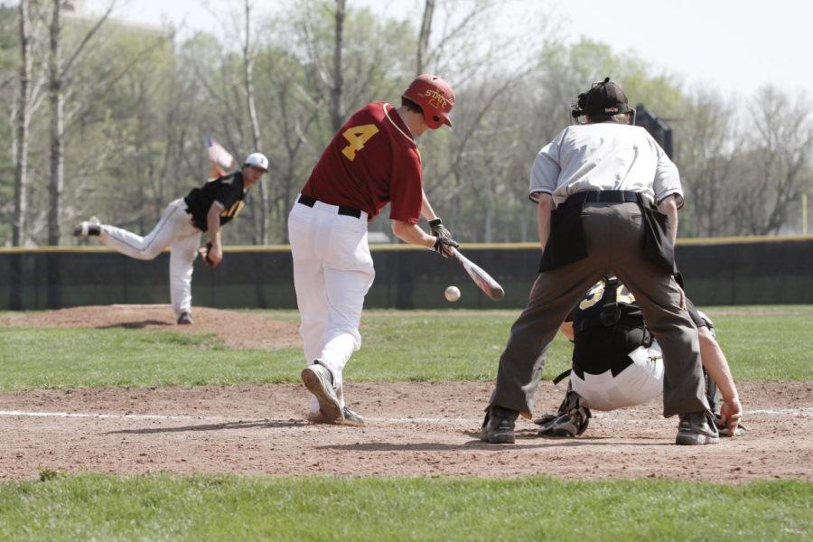Designated hitter Austin Cleveringa makes contact during the Iowa State Club Baseball teams game against Iowa at the Southwest Athletic Complex on Sunday, April 1. The Cyclones struck early with three runs in the first two innings, but eventually fell to the Hawkeyes by a score of 5-3. 
