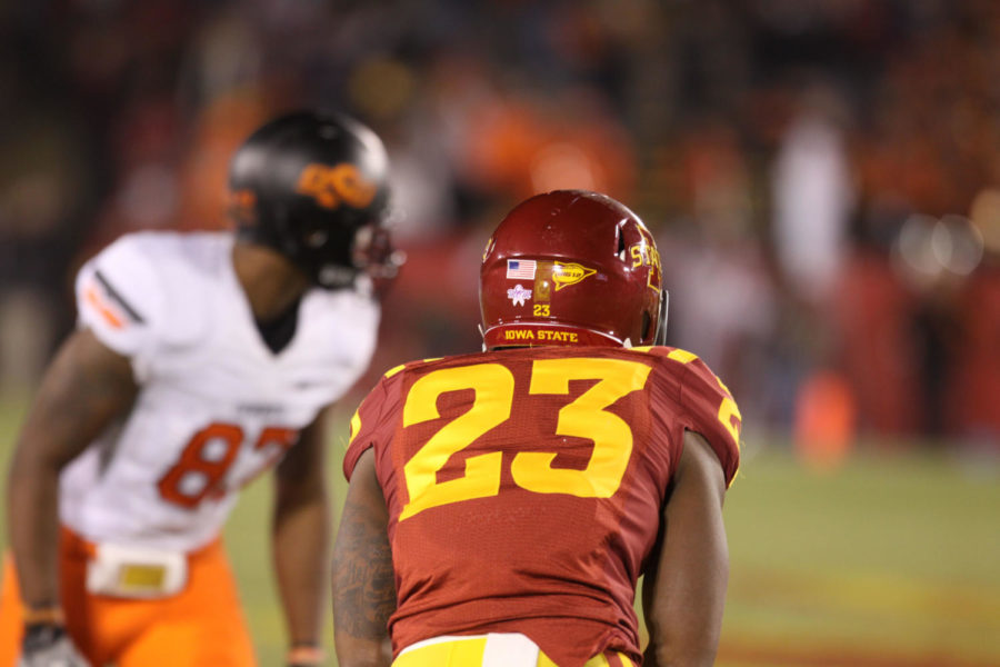 
Defensive back Leonard Johnson lines up against receiver Justin
Blackmon during Friday night's game. Johnson held Blackmon for
under 100 yards. 
