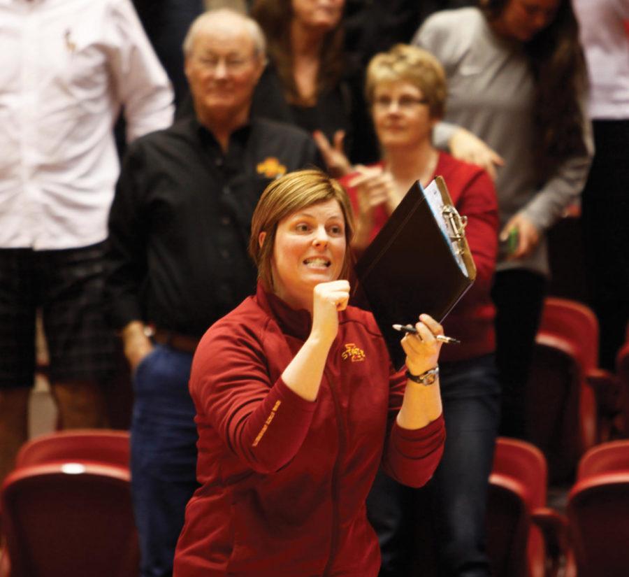 ISU head coach Christy Johnson-Lynch shouts out plays to her players on Saturday, April 21, vs. Nebraska Cornhuskers in Hilton Coliseum. The Cyclones were defeated by the Cornhuskers three sets to one. 
