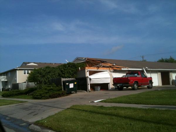 A severe storm hit Ames early Wednesday, May 2, 2012. Winds caused damage to a lot of property, including this garage located on Orion Drive in North Ames. 
