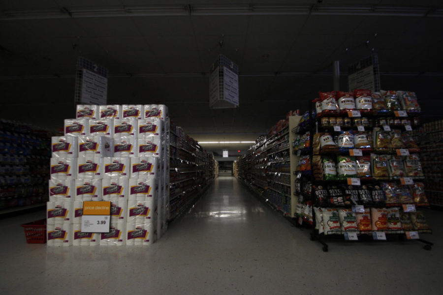 The Hy-Vee aisles were dark during a power outage on Tuesday, June 19, 2012.
