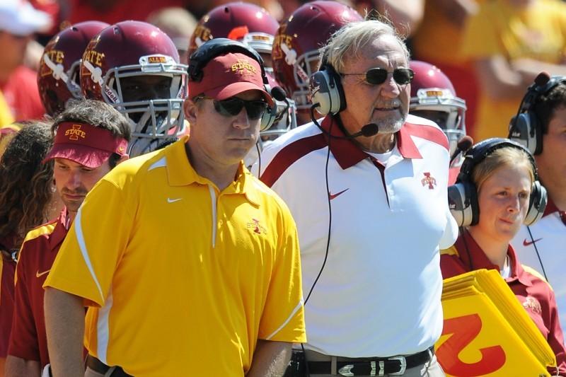 Shane, left, and Wally Burnham coach side by side during a game at Jack Trice Stadium. When Wally was hired in 2009, he recommended his son Shane to ISU football coach Paul Rhoads. The two now spend time together on the sideline, with Wally as defensive coordinator and Shane as defensive tackles coach. 
