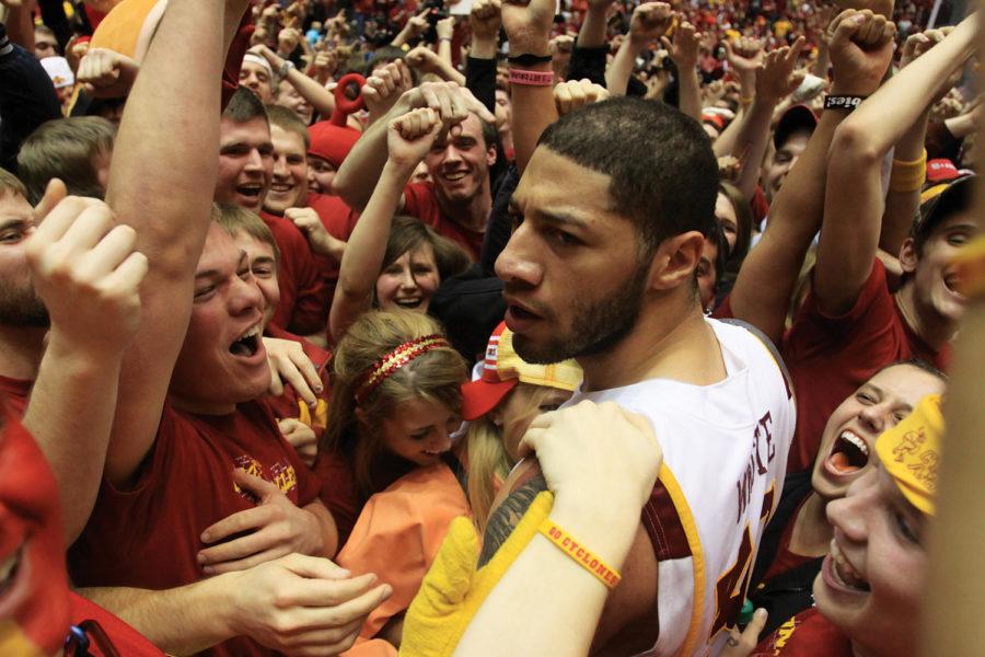 Fans celebrate with forward Royce White after Iowa States 80-72 upset of ninth-ranked Baylor on Saturday at Hilton Coliseum.
