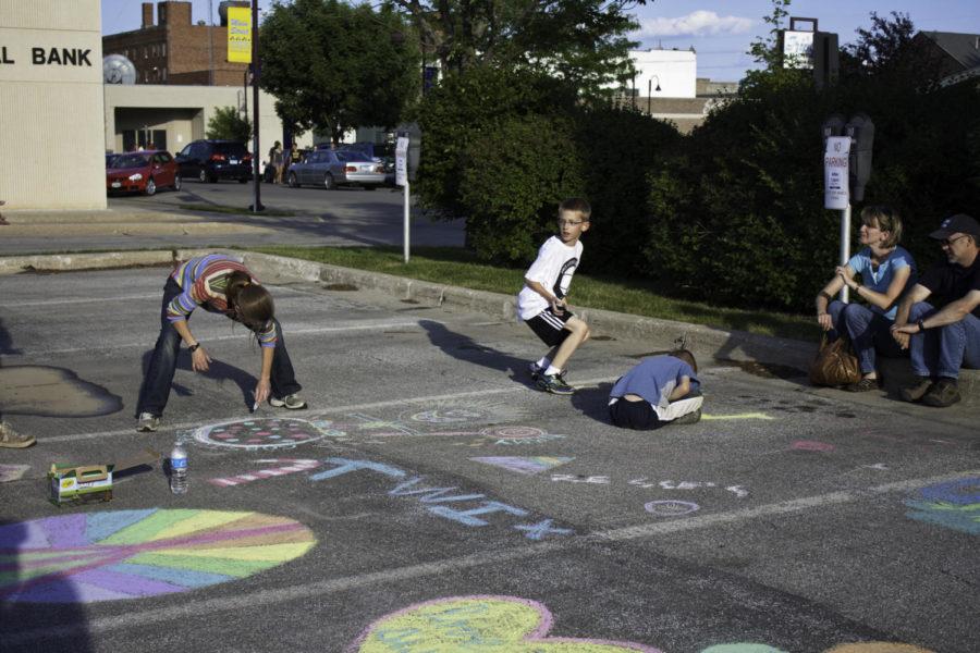 Kids+draw+with+chalk+in+the+City+Hall+parking+lot+during+the+ArtWalk.%C2%A0The+18th+annual+ArtWalk+was+held+on+Main+Street+in+downtown+Ames+on+Friday%2C+June+1%2C+2012.%0A