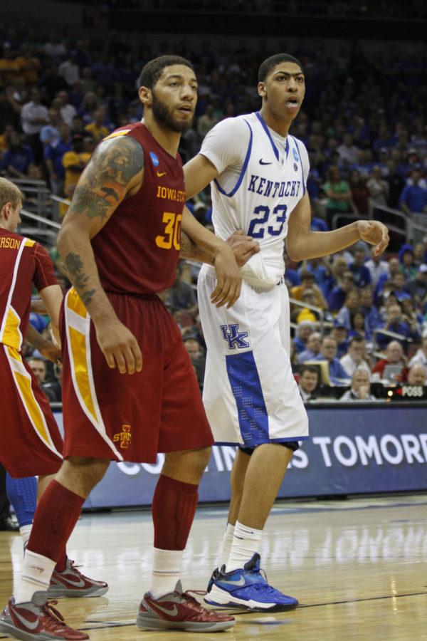 ISU forward Royce White defends Kentucky forward Anthony Davis in the teams matchup Saturday night. Iowa State faced off with No. 1 and overall top-seeded Kentucky in the third round of the NCAA tournament in Louisville, Ky., on Saturday, March 17, falling 87-71 to the Wildcats. The Cyclones trailed for all but the games opening 21 seconds and tied the game only once, at 42 all midway through the second half, in falling to the Wildcats. Kentucky had four players score in double figures, led by Marquis Teagues 24. The Cyclones had three double-digit scorers, led by Whites 23-point effort.
