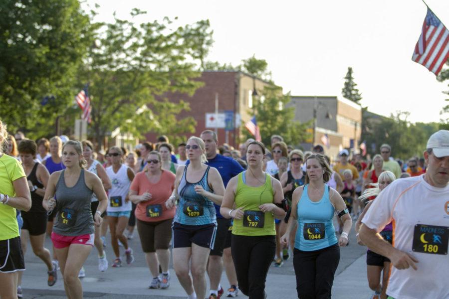 Participants run the 2012 Midnight Madness on Saturday, July 14, in downtown Ames during the Iowa Games. The 2012 Iowa Summer Games were at Iowa State from July 12 to 15.

