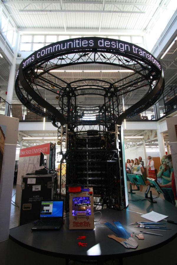 Iowa States Smithsonian Folklife Festival exhibit was displayed on Tuesday, June 12, located in the lower level of the King Pavilion in the College of Design. The exhibit featured a center column of LED panels integrated with interactive touchscreeen workstations.

