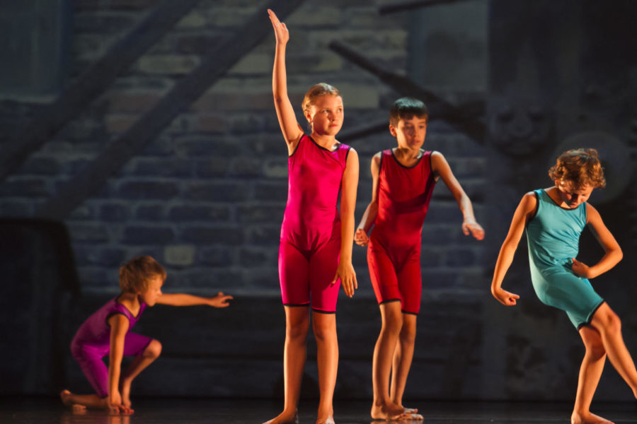Kids+perform+Friday+in+the+24th+annual+Kids+Co-Motion+dance+show+at+the+Ames+City+Auditorium.+The+theme+for+this+years+dance+was+jobs.+Kids-Co+Motion+is+a+three-week+dance+workshop+for+kids+ages+8+through+18.%0A
